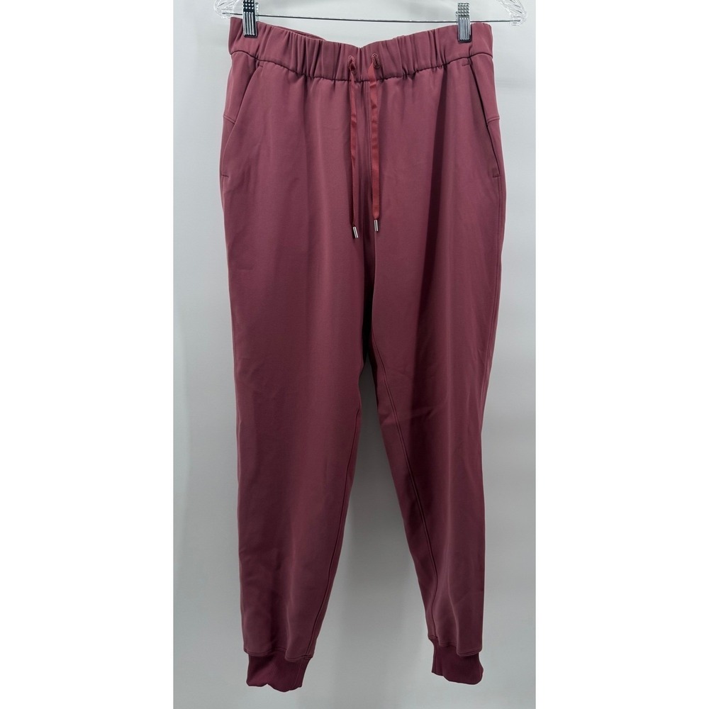 Lululemon On the Fly Jogger 7/8 Woven Pants Mauve Rose Pink Size 6